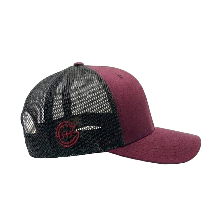 Side view of Shift Culture maroon and black mesh back hat with maroon SC gear logo embroidered on side panel and black snapback closure