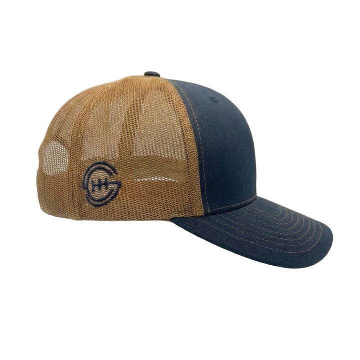 Navy and brown mesh Shift Culture hat with side embroidered logo in dark navy