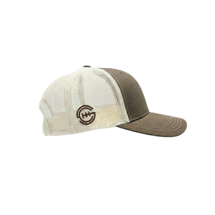 Side view of olive and tan Shift Culture mesh hat with embroidered gear logo on back panel